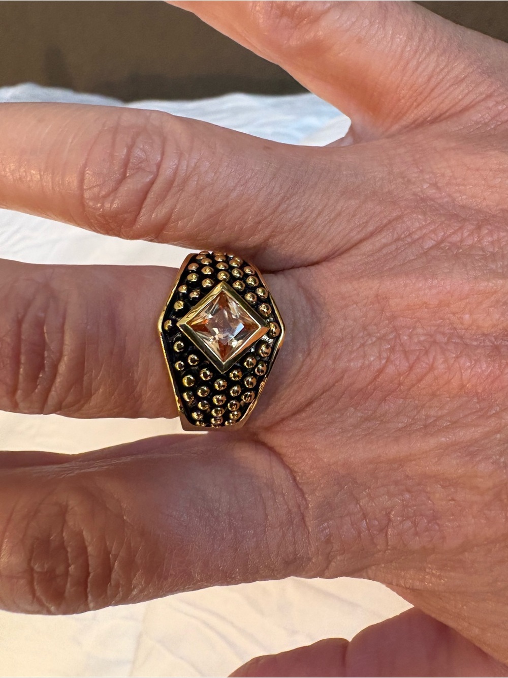 Gold-Tone Black Beaded Ring with Square cubic zirconia brown Crystal Center 10